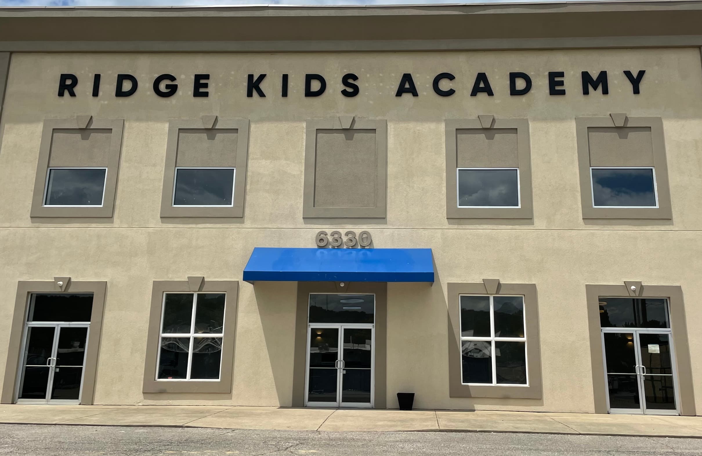 Ridge Kids Academy campus and school sign